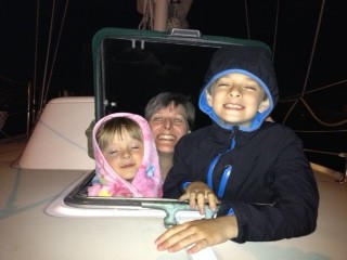 Family watching fireworks from the forward hatch on Shannon